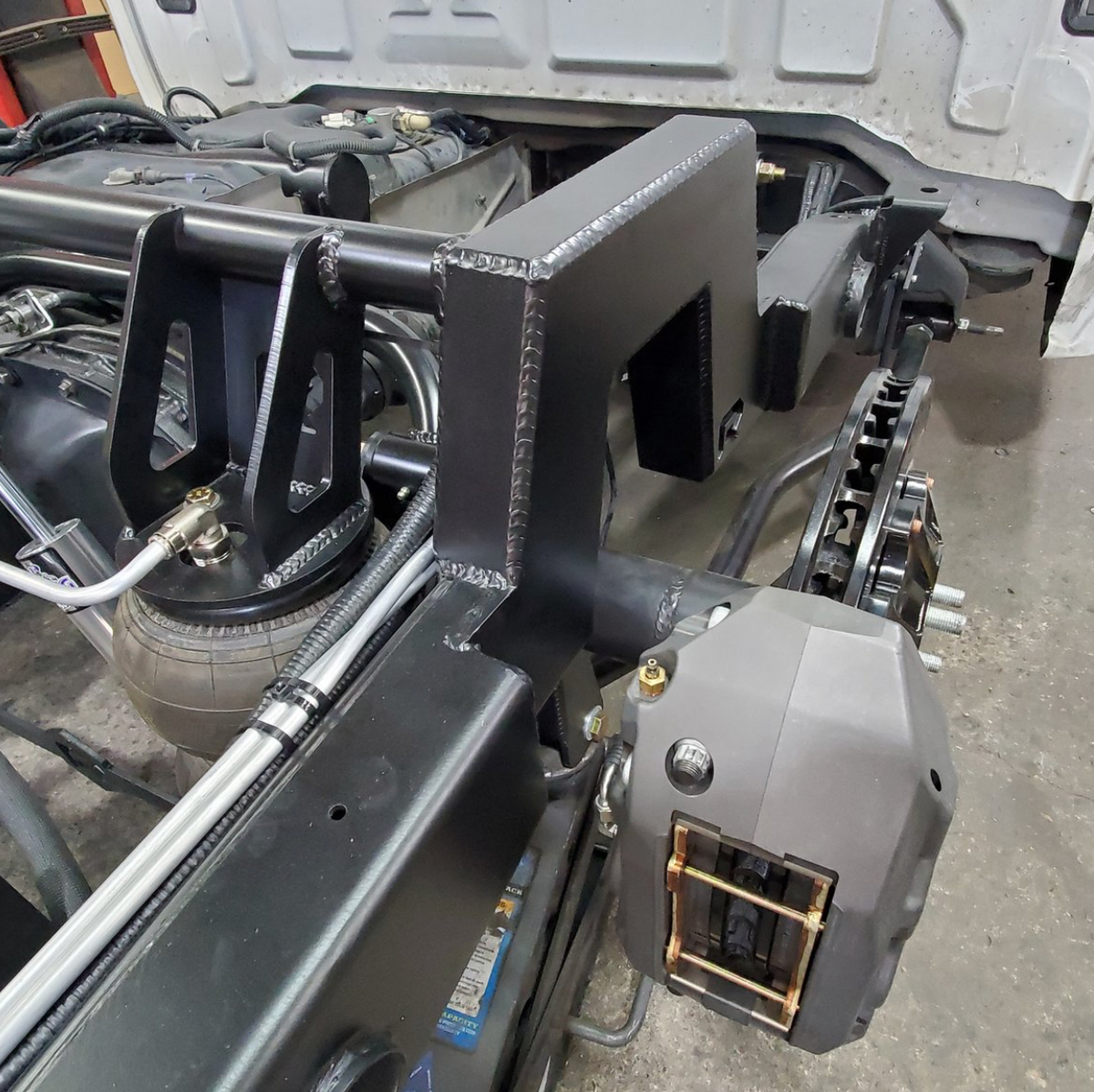 2014-2018 Silverado Sierra Narrowed Step Notch, Monster Notch, Airbag & Coil Over Suspension - Reklez Suspension Works - view