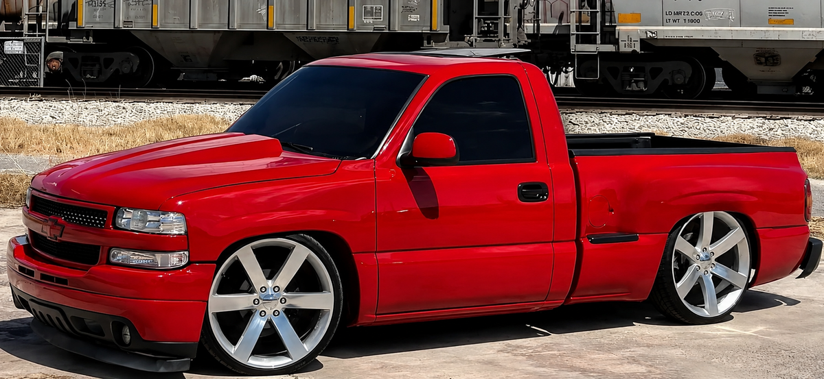 Lowered red Chevrolet pickup truck