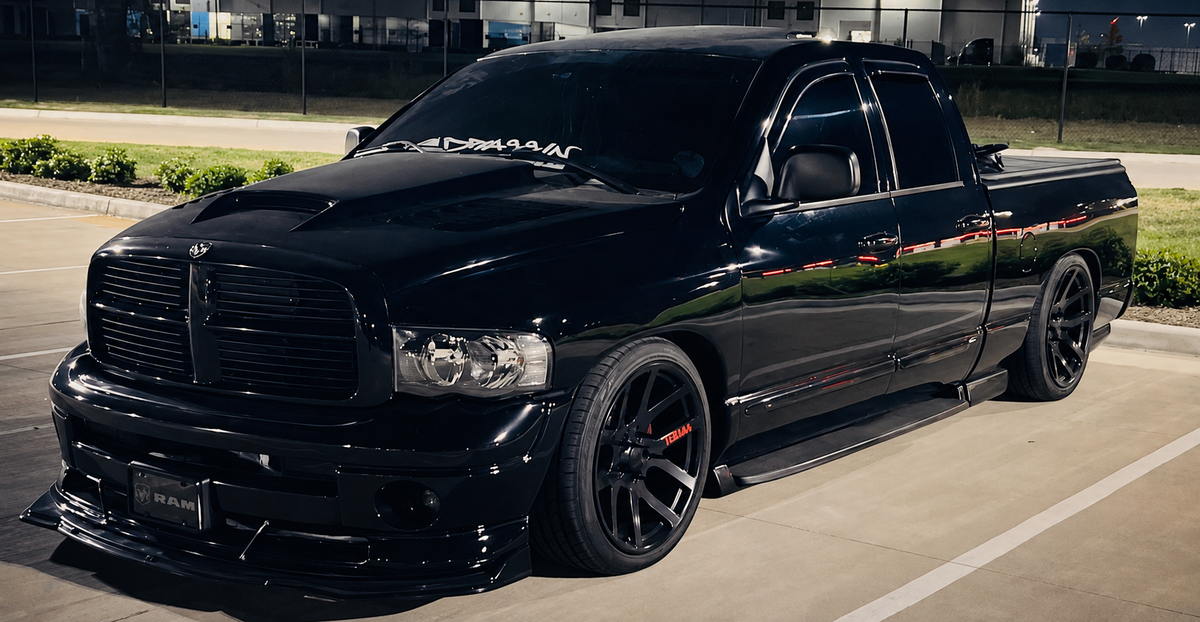 Lowered black Ram pickup truck